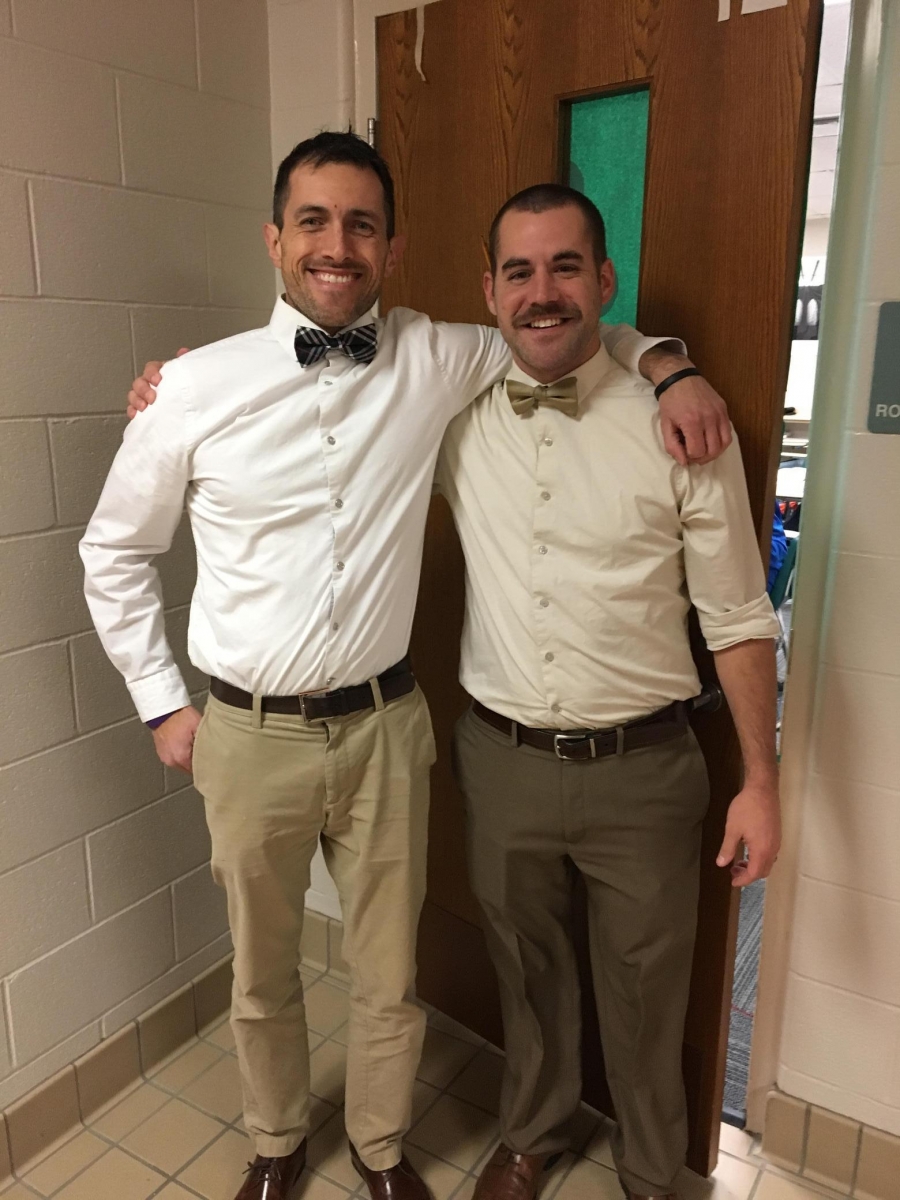 two men wearing bow ties